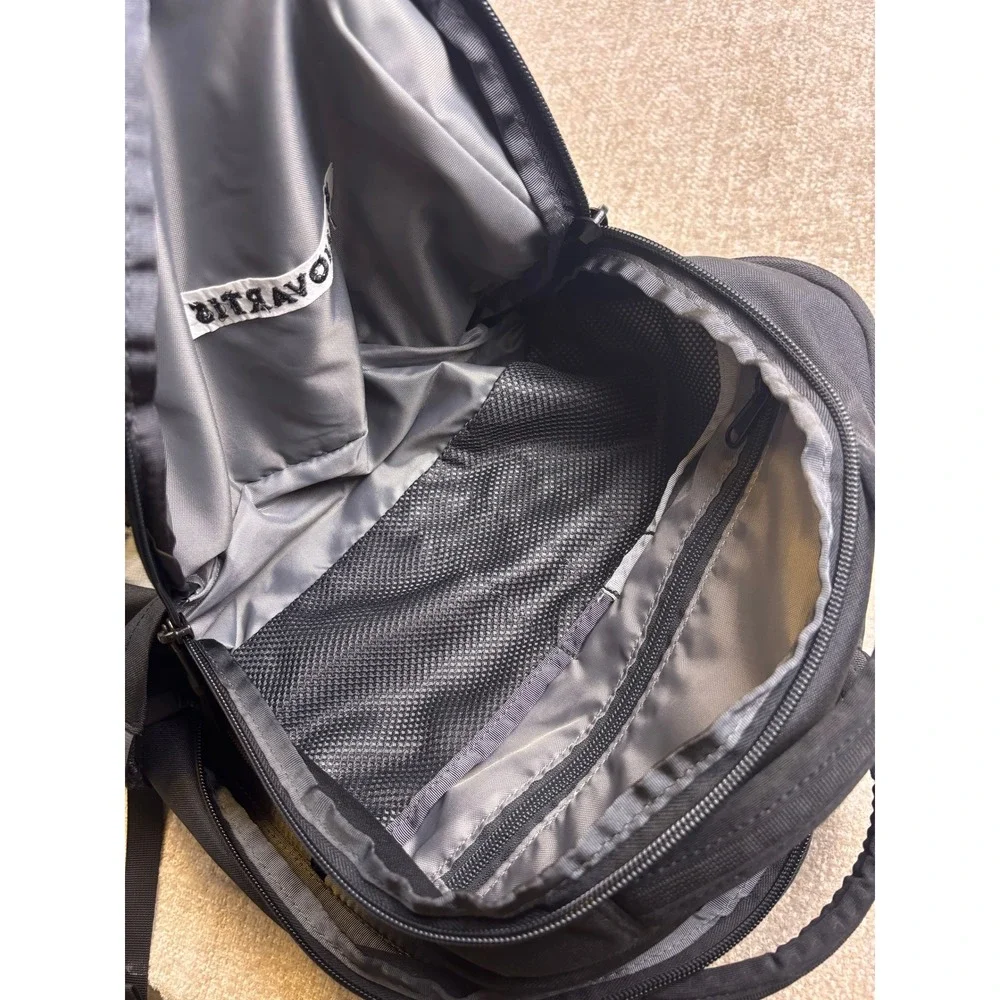 The North Face Stalwart Backpack Grey Black Novartis Logo Laptop Bag NF0A52S7